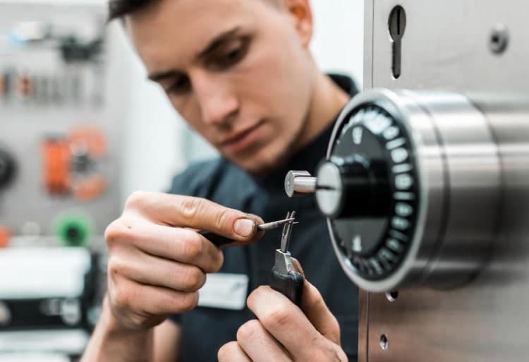 a locksmith doing a complicated job